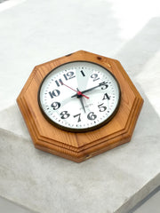 Horloge octogonale en bois « Person »
