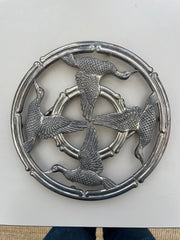 Dessous de plat en métal canards extensible