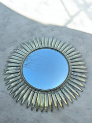 Miroir soleil métal doré