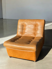 Chauffeuse en cuir cognac 1960
