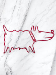 Iconique porte manteau Frän Ikea 90’ le chien rouge