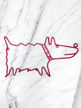 Iconique porte manteau Frän Ikea 90’ le chien rouge