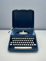 Machine à écrire vintage bleue roi Remington fonctionnelle
