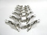 Série de 12 porte couverts métal argenté panthère