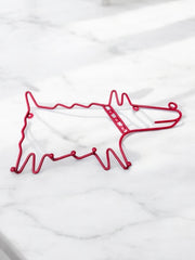 Iconique porte manteau Frän Ikea 90’ le chien rouge