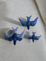 Trio d’hirondelles en céramique