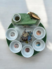 Service a saké siffleur femmes dénudées