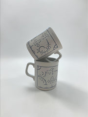 Duo de tasses de la manufacture Boch. Décor 