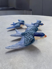 Trio d’hirondelles en céramique