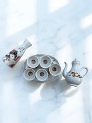 Service à saké hommes et femmes nues