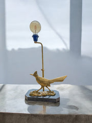 Majestueuse ancienne lampe oiseau en laiton