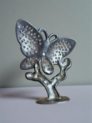 Porte boucles d’oreilles papillon