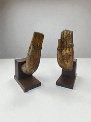 Serres livres mains Bouddha